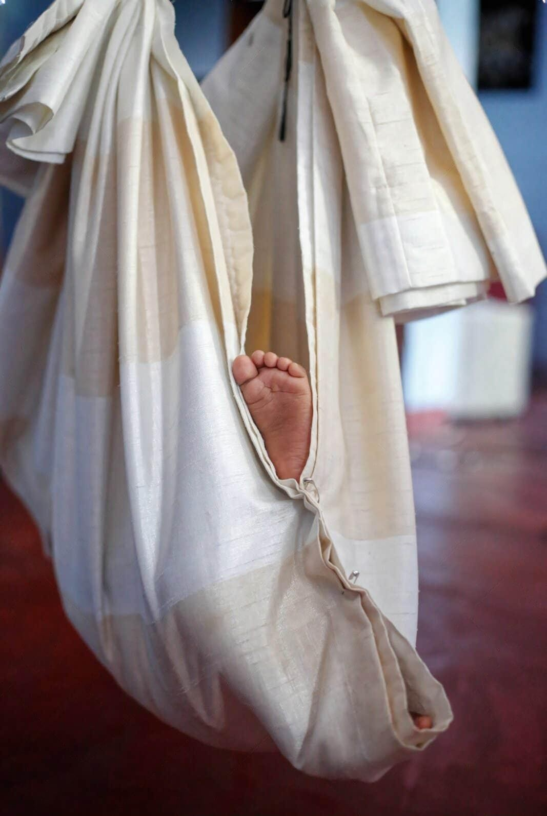 A Tradition of Comfort Carried in Cloth